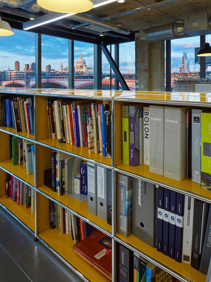 metal USM Haller bookshelves in an office library 