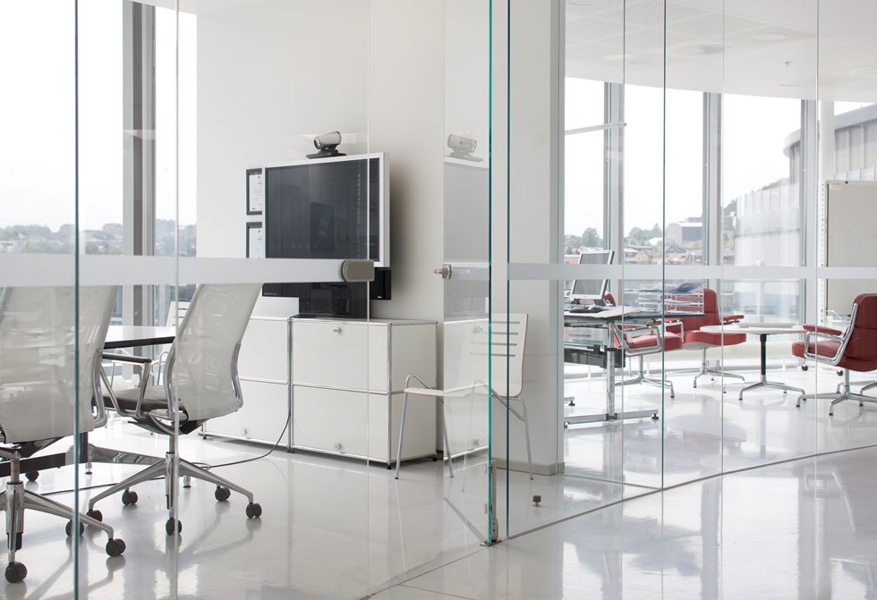white USM haller storage unit with draws in an executive boardroom