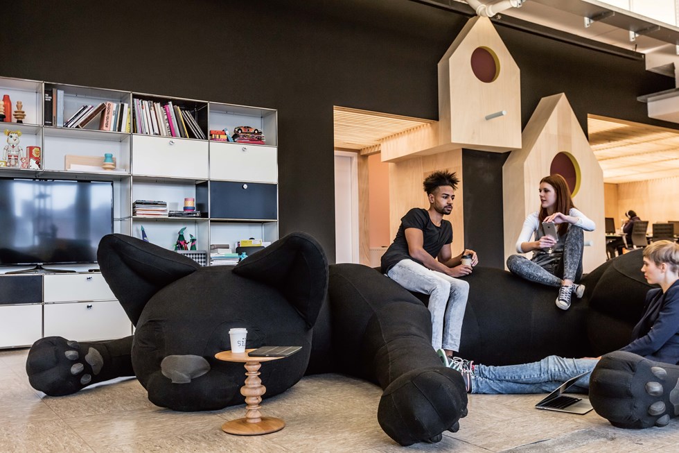 playful office breakout space with beanbag and USM Haller media unit