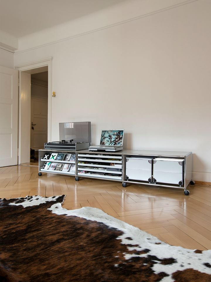 white USM Haller media unit with storage for vinyls in a living room