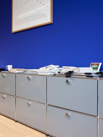 grey USM Haller sideboards in an open plan modular office