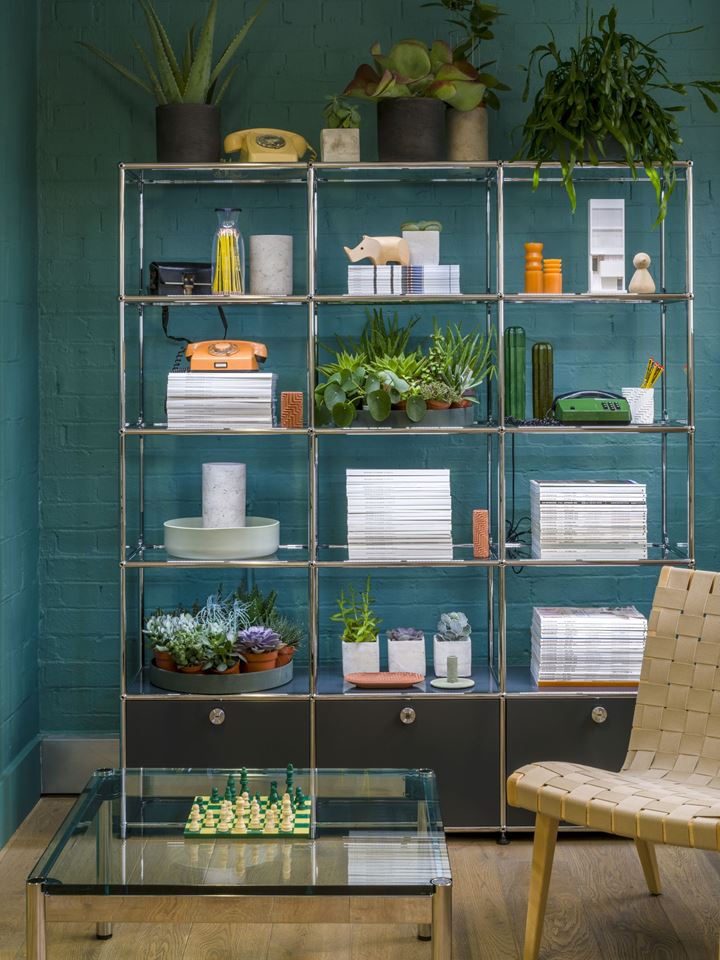 anthracite USM Haller bookcase with lighting and plants