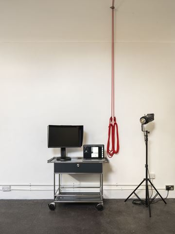 modern photography studio with grey USM Haller trolley for computer